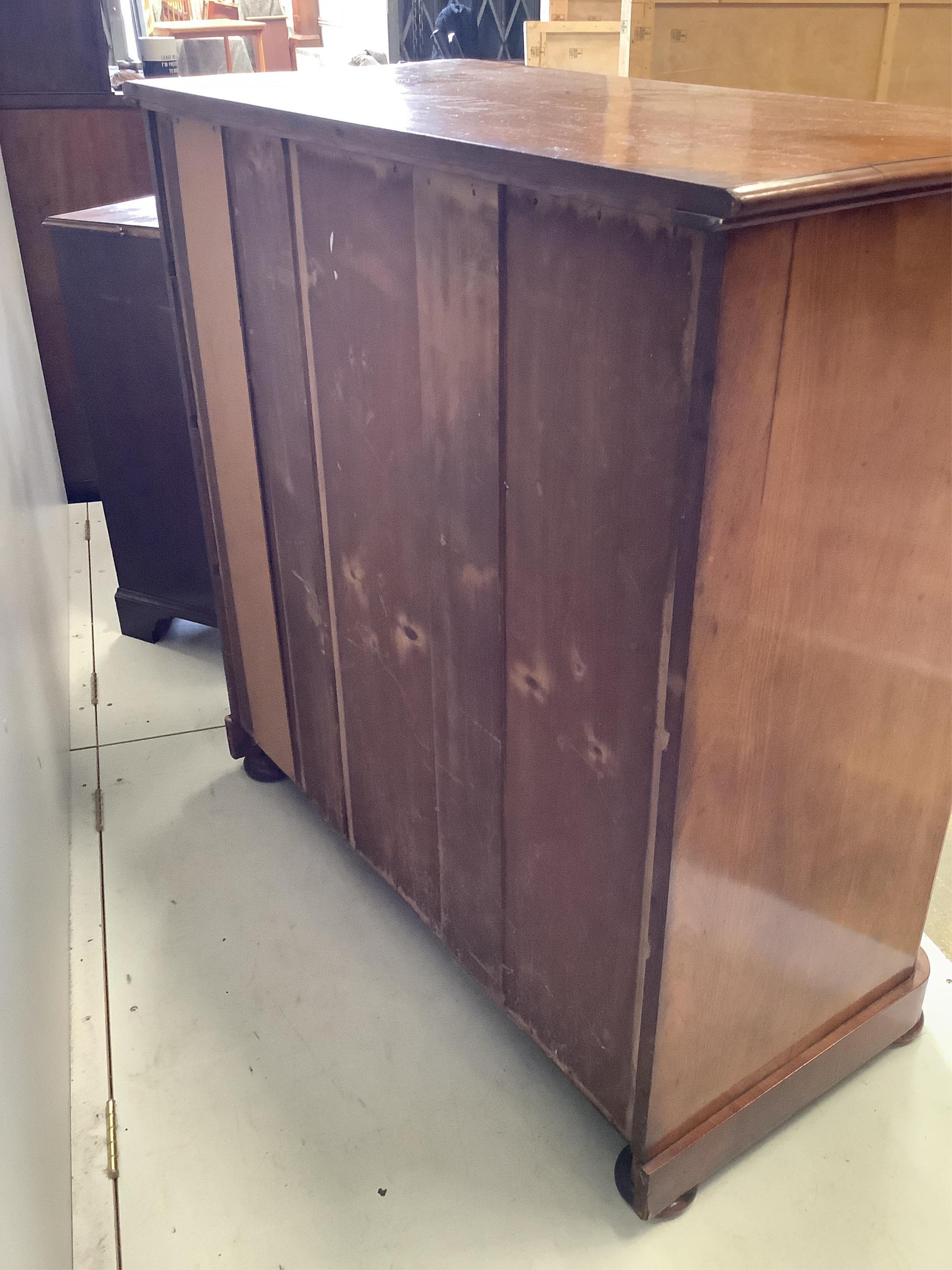 A Victorian mahogany chest of five drawers, width 111cm. depth 55cm, height 113cm. Condition - fair-good